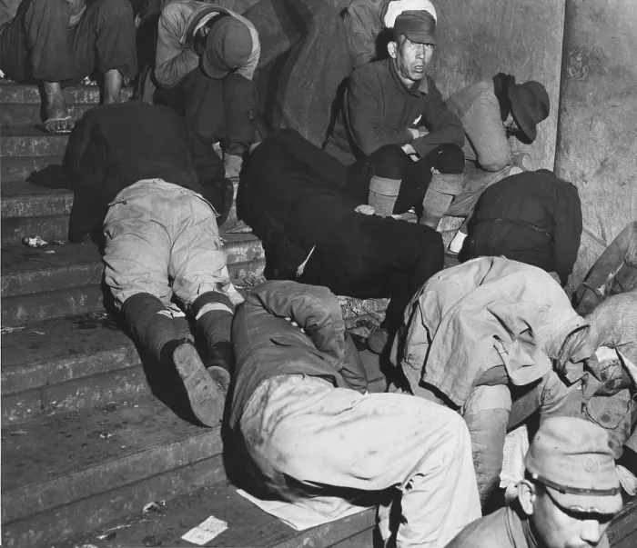 Framed Print : Homeless Japanese in Tokyo, months after Japan's World War II surrender, spend the night on the steps of one of Tokyo's subway stations