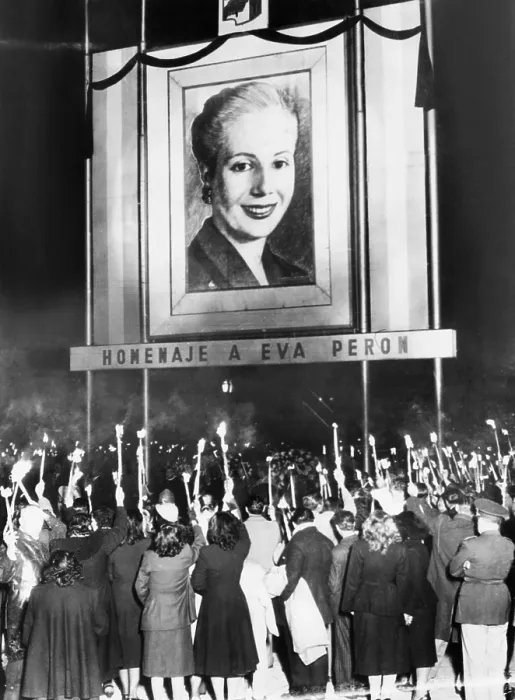 Framed Print : Honor Eva Peron. Argentines mourning the death of Eva Peron beneath a huge portrait of the deceased wife of their nation's President, Juan Peron Framed Print : Honor Eva Peron. Argentines mourning the death of Eva Peron beneath a huge portrait of the deceased wife of their nation's President, Juan Peron