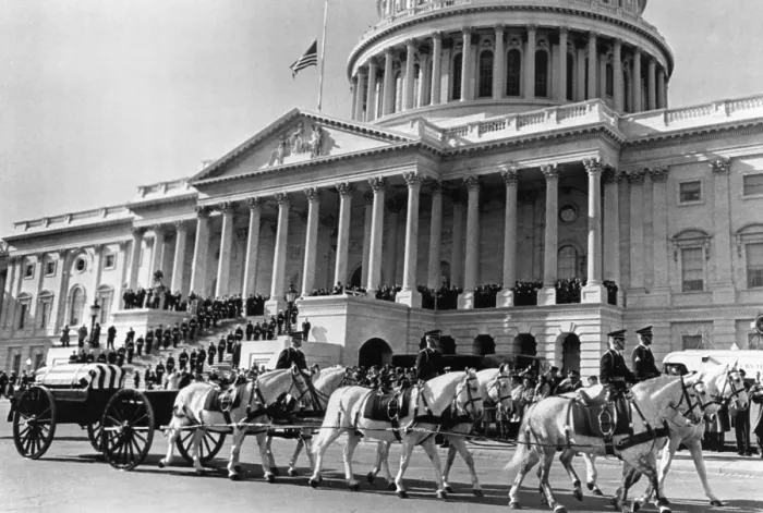 Framed Print : Horse-drawn carriages bearing remains of President John F. Kennedy after his assassination, pulling away from the Capitol to begin procession to St