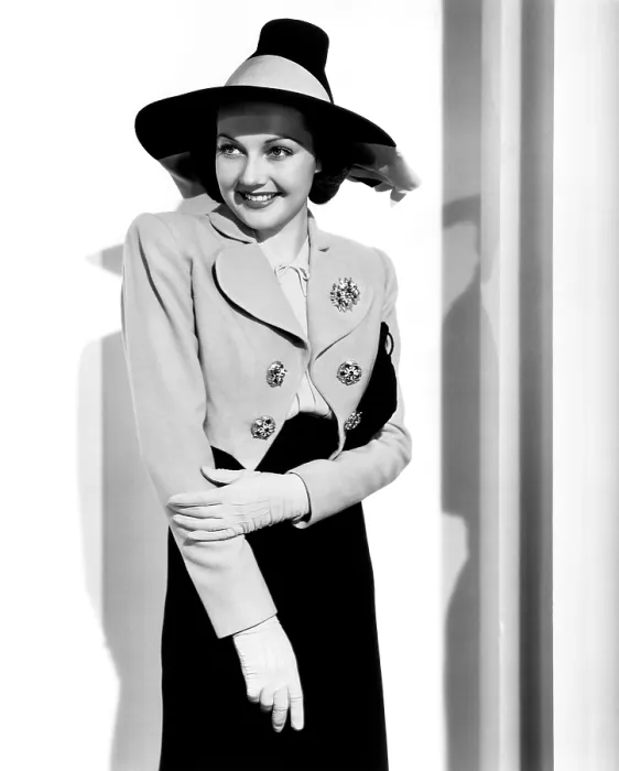 Framed Print : HOTEL FOR WOMEN, Lynn Bari, in a chartreuse bolero jacket with jeweled buttons by Gwen Wakeling, 1939. TM and copyright 20th Century Fox Film Corp