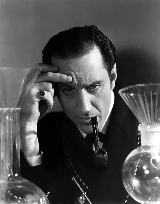 Framed Print : THE HOUND OF THE BASKERVILLES, Basil Rathbone, 1939, deep in thought as Sherlock Holmes, TM and Copyright (c) 20th Century Fox Film Corp. All rights reserved
