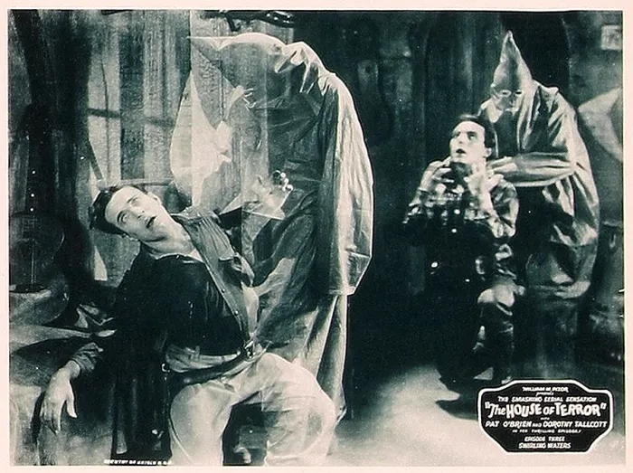 Framed Print : THE HOUSE OF TERROR, front left: Jack La Rue, scene card from a lobbycard set to this serial, 1928