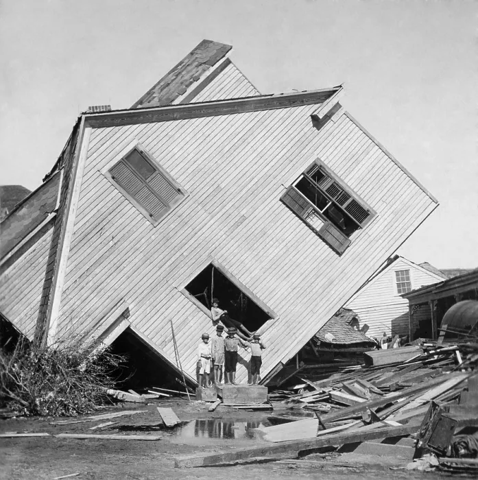 Framed Print : A house tipped on side after the 15 foot storm surge of the Galveston Hurricane of Sept. 1900. Five boys pose in front of the house on Avenue N (BSLOC_2017_17_88) Framed Print : A house tipped on side after the 15 foot storm surge of the Galveston Hurricane of Sept. 1900. Five boys pose in front of the house on Avenue N (BSLOC_2017_17_88)