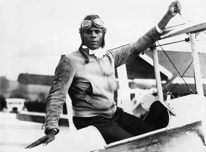 Framed Print : Hubert Julian at Abridge Aerodrome, in Essex, England. Aug. 30, 1934. He announced plans to enter London-Melbourne air race as a representative of Abyssinia, but did not