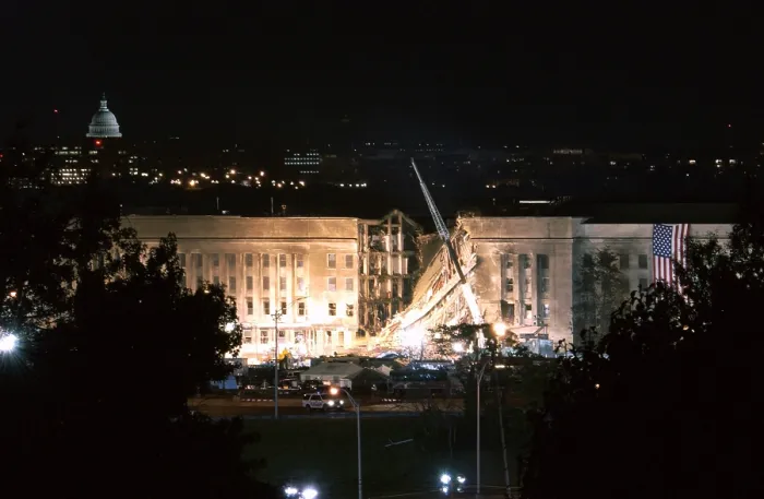 Framed Print : The huge 20 x 38 feet American flag is to the right of the damaged area of the Pentagon on the night of Sept. 12 2001 Framed Print : The huge 20 x 38 feet American flag is to the right of the damaged area of the Pentagon on the night of Sept. 12 2001