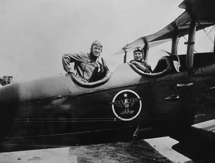 Framed Print : Humorist Will Rogers takes a backseat to Gen. Billy Mitchell at Bolling Field, Washington, DC. They flew in the open cockpit Army Air Force bi-plane on April 24, 1925