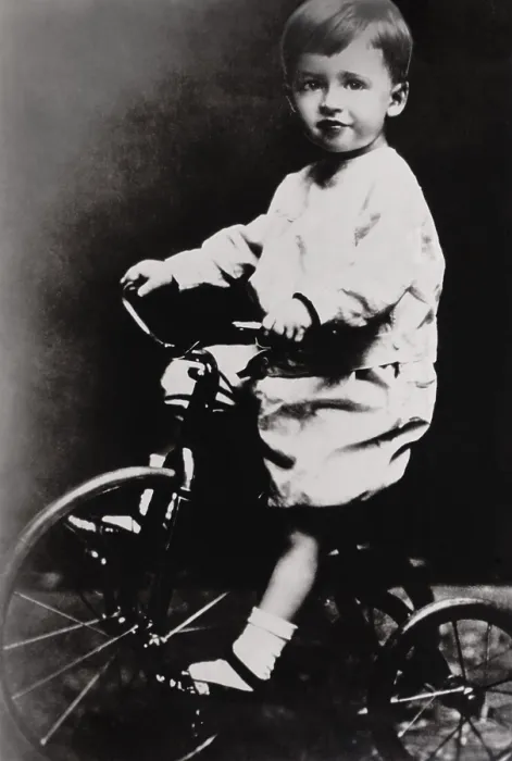 Framed Print : Humphrey Bogart belies his tough guy screen persona in a childhood photo on a tricycle, c. 1904 (BSLOC_2018_3_23) Framed Print : Humphrey Bogart belies his tough guy screen persona in a childhood photo on a tricycle, c. 1904 (BSLOC_2018_3_23)