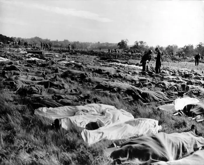 Framed Print : Hundreds of dead soldiers in stretchers covered with a blankets after D-Day