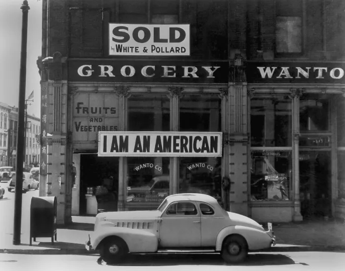 Framed Print : I AM AN AMERICAN sign on a store front. The owner, a University of California graduate of Japanese descent, put the sign up the day after Pearl Harbor