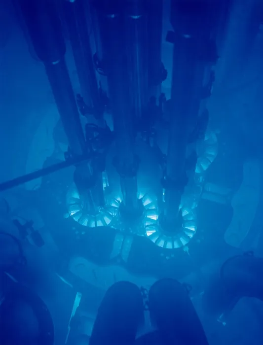 Framed Print : Idaho National Laboratory's Advanced Test Reactor core powered up, with the fuel plates glowing bright blue. The core is submerged in water for cooling