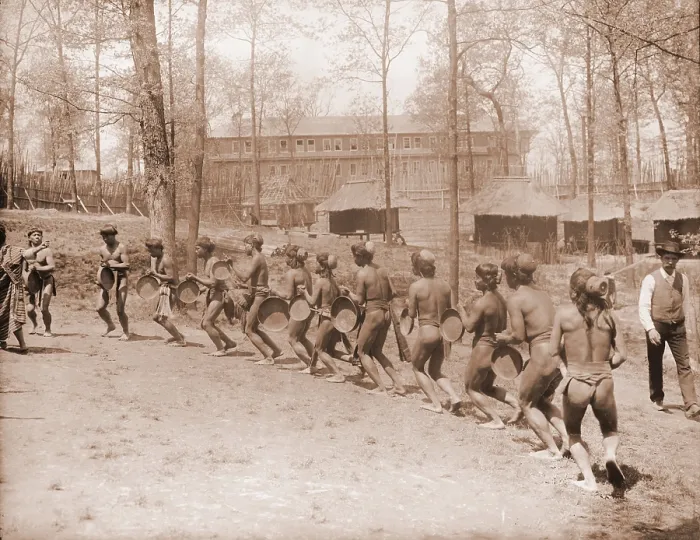 Framed Print : Igorot men from the Philippines dance in a semi-circle. The huts in the background are part of the Louisiana Purchase Exposition. 1904 Framed Print : Igorot men from the Philippines dance in a semi-circle. The huts in the background are part of the Louisiana Purchase Exposition. 1904