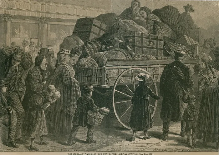 Framed Print : An Immigrant Wagon packed with baggage, is followed by a procession of immigrants heading for the train station and destinations in the US interior. 1870's