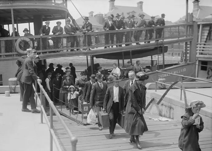 Framed Print : Immigrants arriving at Ellis Island from a ferryboat, c. 1915-1920. (BSLOC_2018_1_15) Framed Print : Immigrants arriving at Ellis Island from a ferryboat, c. 1915-1920. (BSLOC_2018_1_15)