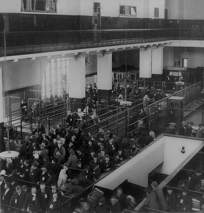 Framed Print : Immigrants working their way through the maze of barriers and lines at the new Immigrant Building, Ellis Island, in New York Harbor. Ca. 1904