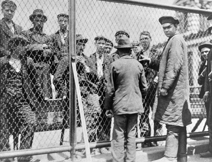 Framed Print : Immigration. Failed immigrants awaiting deportation on the roof of the main building at Ellis Island. Halftone photograph ca. 1902 Framed Print : Immigration. Failed immigrants awaiting deportation on the roof of the main building at Ellis Island. Halftone photograph ca. 1902