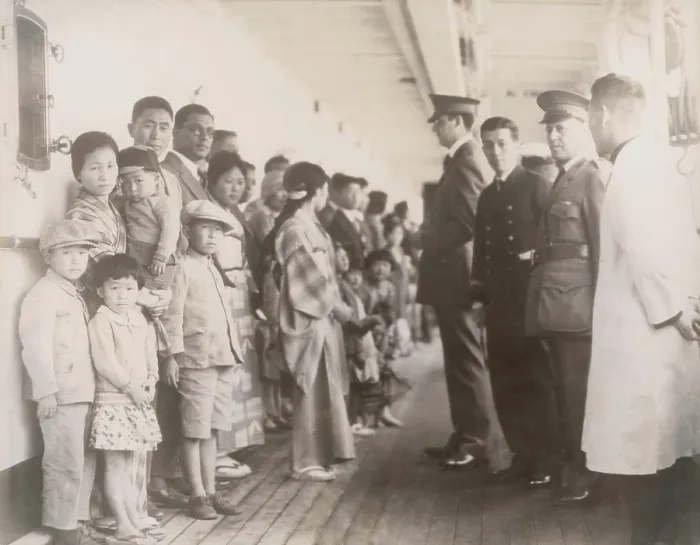 Framed Print : Immigration officials examining Japanese passengers aboard the ship Shimyo Maru, at Angel Island 1931. Immigration Act of 1924 severely restricted Japanese immigration to the U.S