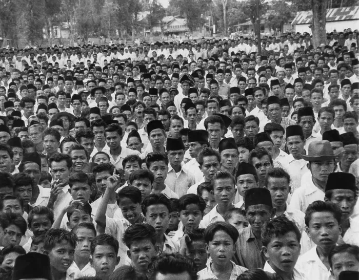 Framed Print : Indonesians in an anti-Sukarno rally in Batu Sankar, Sumatra. They protested President Sukarno's consolidation of dictatorial powers. 1958 Framed Print : Indonesians in an anti-Sukarno rally in Batu Sankar, Sumatra. They protested President Sukarno's consolidation of dictatorial powers. 1958