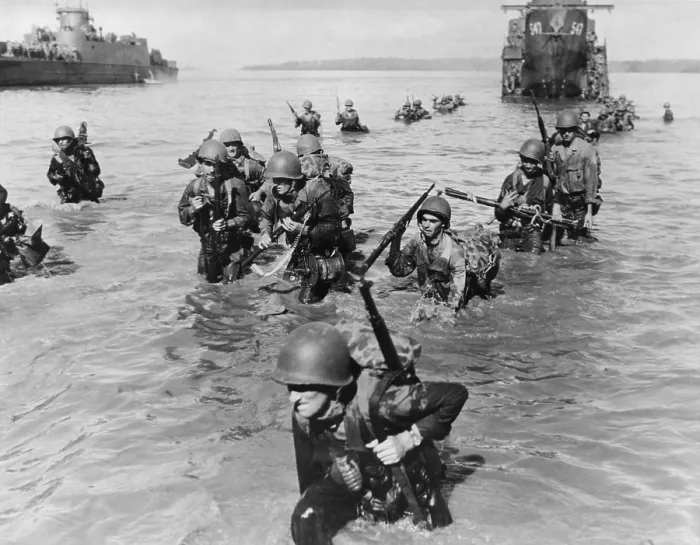 Framed Print : Infantrymen wade ashore in neck-deep water from their LCI's to Morotai Island Beach