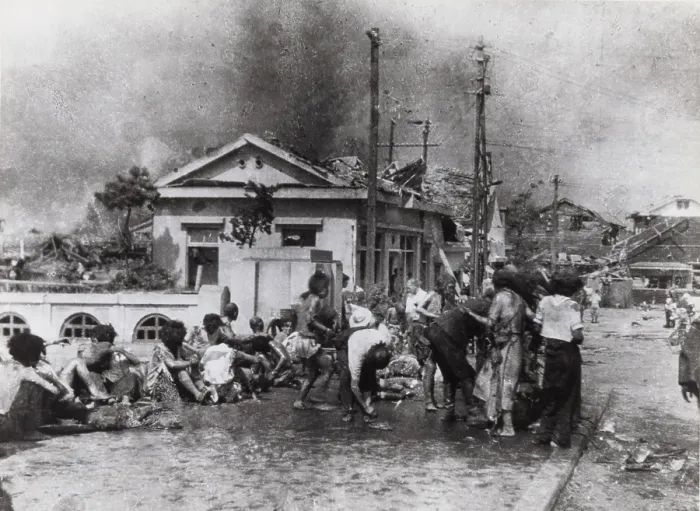 Framed Print : Injured Hiroshima civilians who survived the blast gathered on pavement west of Miyuki-bashi. At about 11:00 AM on August 6, 1945. Photo by Yoshito Matsushige. World War 2