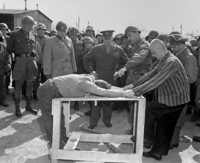 Framed Print : Inmates of Ohrdruf concentration camp demonstrate how they were tortured. Watching are Generals Eisenhower, Bradley, and Patton. April 12, 1945, Gotha, Germany, World War 2