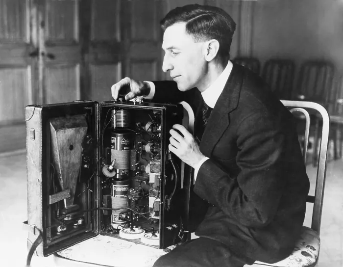 Framed Print : Inspector at the radio laboratory of the U.S. Bureau of Standards, Chicago, examines a portable radio built in a suitcase. 1920s Framed Print : Inspector at the radio laboratory of the U.S. Bureau of Standards, Chicago, examines a portable radio built in a suitcase. 1920s