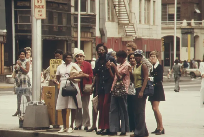 Framed Print : Integrated group of commuters waiting on a street corner for the city bus in Atlanta Georgia. Ca. 1975 Framed Print : Integrated group of commuters waiting on a street corner for the city bus in Atlanta Georgia. Ca. 1975