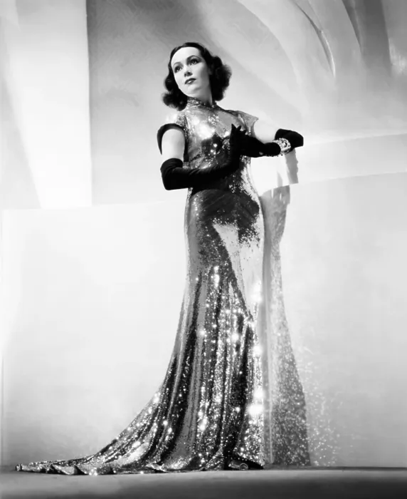 Framed Print : INTERNATIONAL SETTLEMENT, (aka SHANGHAI DEADLINE), Dolores del Rio, in a copper-sequin dress by Herschel McCoy, 1938, TM and Copyright 20th Century-Fox Film Corp