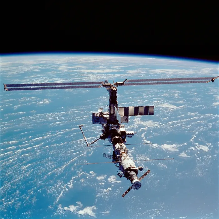 Framed Print : International Space Station in 2002. View of the expanding structure with added modules, solar panels, robotic cranes and a docked Soyuz space craft. April 17, 2002 Framed Print : International Space Station in 2002. View of the expanding structure with added modules, solar panels, robotic cranes and a docked Soyuz space craft. April 17, 2002