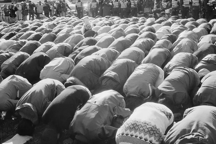 Framed Print : Iranian men kneeling in prayer at an demonstration during the Iran Hostage Crisis in Washington D.C. Nov. 30 1979 Framed Print : Iranian men kneeling in prayer at an demonstration during the Iran Hostage Crisis in Washington D.C. Nov. 30 1979
