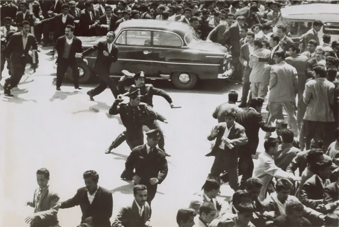 Framed Print : Iranian police assaulting school teachers attempting a sit-down strike for higher wages. 1961
