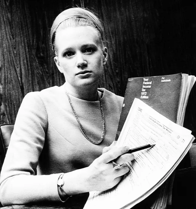 Framed Print : The IRS Marriage Tax in 1971. Catherine McGrath, an attorney with the Security and Exchange Commission accused Congress of discriminatory tax rates. Jan. 22, 1972. Mrs