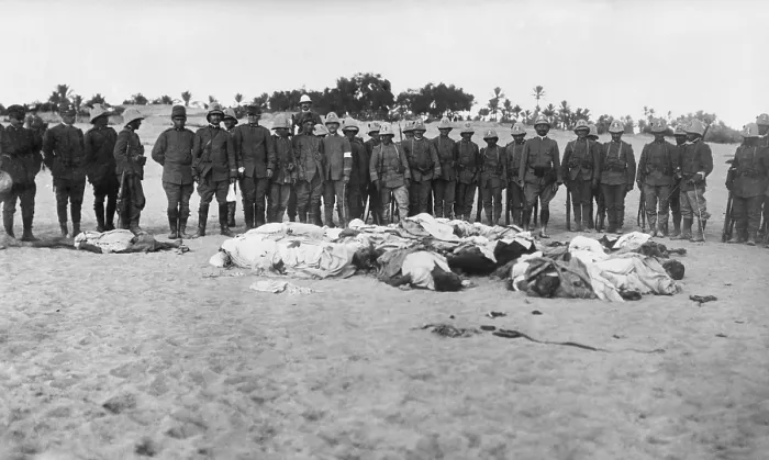 Framed Print : Italian soldiers gathered around dead bodies of Arabs during the Italo-Turkish War