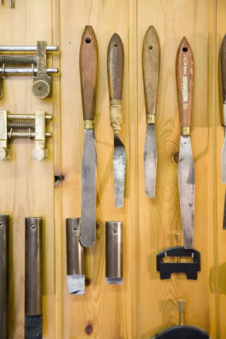 Framed Print : ITALY. Cremona. Luthier's workshop. Palette knifes to make string instruments. AISA / Everett Collection**US SALES ONLY**