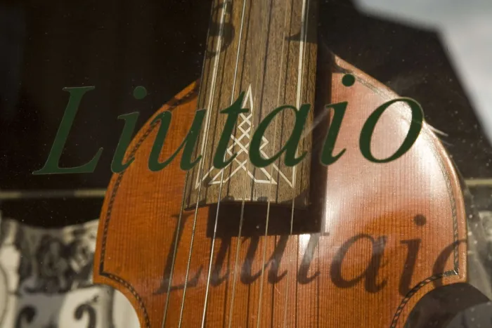 Framed Print : ITALY. Cremona. Luthier's workshop. Detail of a double bass in the shop window. AISA / Everett Collection**US SALES ONLY**