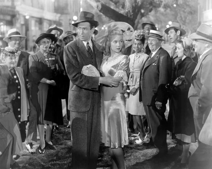 Framed Print : IT'S A WONDERFUL LIFE, center from left: James Stewart, Gloria Grahame, 1946 Framed Print : IT'S A WONDERFUL LIFE, center from left: James Stewart, Gloria Grahame, 1946