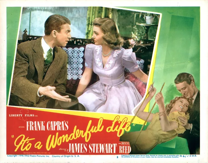 Framed Print : IT'S A WONDERFUL LIFE, US lobbycard, from left: James Stewart, Donna Reed, 1946