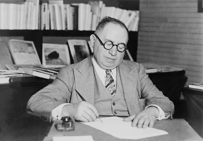 Framed Print : Izzy Einstein (1880-1938) signing contract for his memoirs in 1932 Framed Print : Izzy Einstein (1880-1938) signing contract for his memoirs in 1932