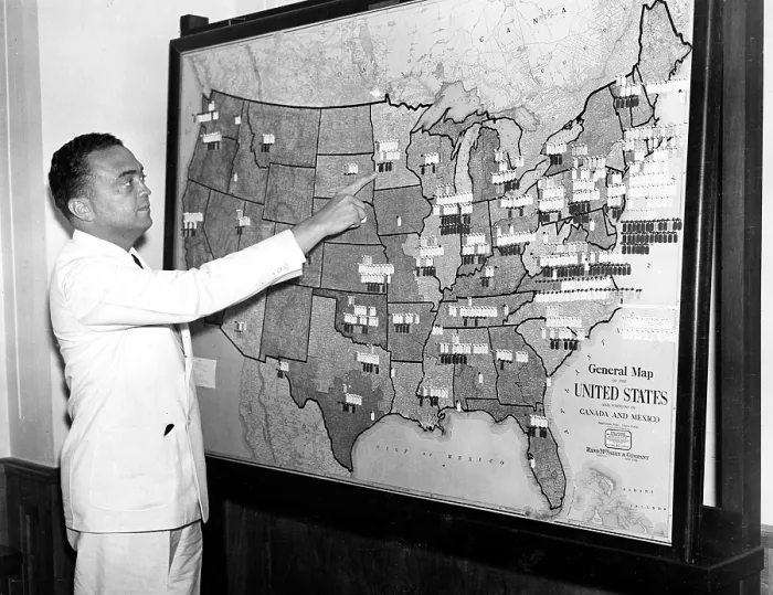 Framed Print : J. EDGAR HOOVER pointing to map showing location of F.B.I. agents throughout the U.S. 07 / 18 / 35.. Courtesy: CSU Archives  /  Everett Collection