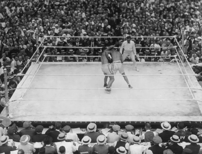 Framed Print : Jack Dempsey and Georges Carpentier boxing for the World Heavyweight title, July 2, 1921. Over 80, 000 fans brought in boxing's first million dollar gate Framed Print : Jack Dempsey and Georges Carpentier boxing for the World Heavyweight title, July 2, 1921. Over 80, 000 fans brought in boxing's first million dollar gate