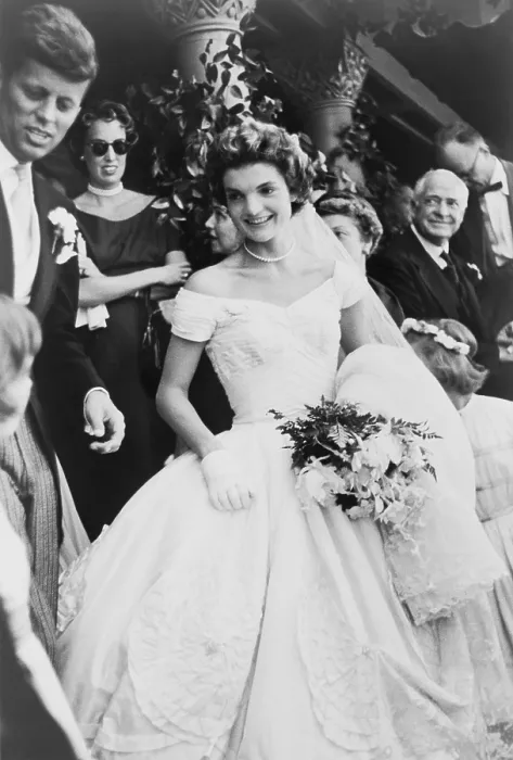Framed Print : Jacqueline Bouvier Kennedy emerging from St. Mary's church in Newport Rhode, Island, on her wedding day. At far left is Senator Jack Kennedy