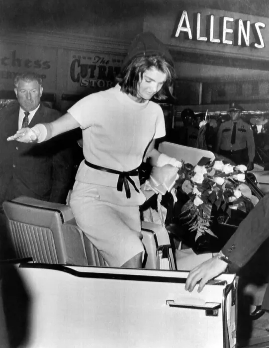 Framed Print : Jacqueline Kennedy balances gracefully as she exits a convertible on the day prior to President John Kennedy's assassination. Nov. 11, 1963 Framed Print : Jacqueline Kennedy balances gracefully as she exits a convertible on the day prior to President John Kennedy's assassination. Nov. 11, 1963