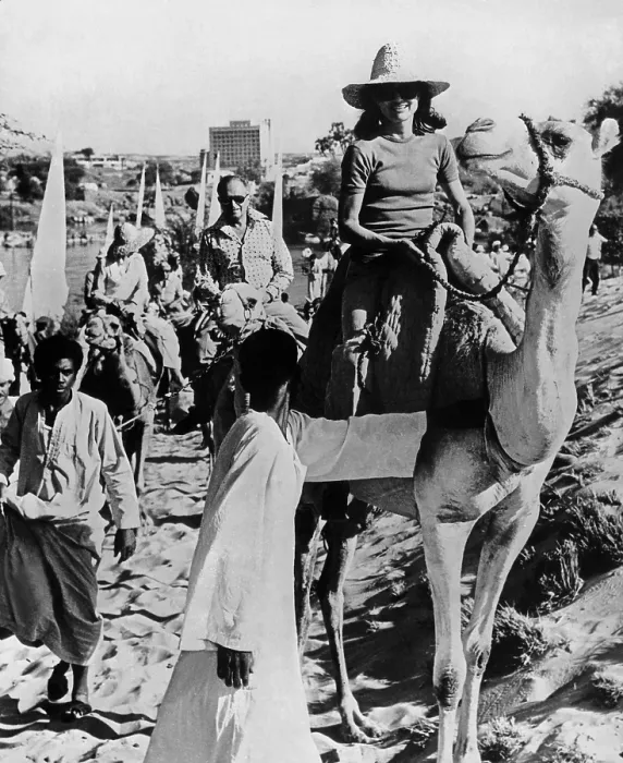 Framed Print : Jacqueline Kennedy Onassis on vacation in Egypt. The expert equestrian leads a tourist camel train in Aswan, Egypt. March 28, 1974. (CSU_ALPHA_788) CSU Archives / Everett Collection