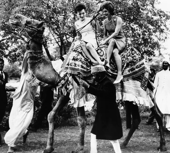 Framed Print : Jacqueline Kennedy and her sister, Princess Lee Radziwill riding a camel. The First Lady was on a good will trip to Pakistan. March 25, 1962