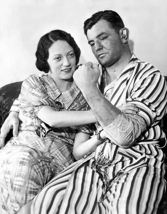 Framed Print : James Braddock shows off to wife May the left that confounded Max Baer and won him the Championship. Mayflower Hotel, NY, NY, June 15, 1935 Framed Print : James Braddock shows off to wife May the left that confounded Max Baer and won him the Championship. Mayflower Hotel, NY, NY, June 15, 1935