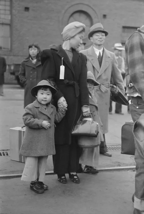 Framed Print : Japanese-American family waiting for train to take them to Manzanar internment camp. World War 2, April 1942 photo by Russell Lee. (BSLOC_2013_11_165) Framed Print : Japanese-American family waiting for train to take them to Manzanar internment camp. World War 2, April 1942 photo by Russell Lee. (BSLOC_2013_11_165)