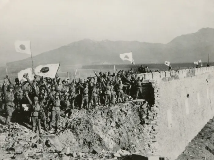 Framed Print : Japanese soldiers celebrate the capture of Nanking, China. A detachment of Japanese troops on the high wall of Nanking give a Bauzai salute. Flags of Japan is waved in victory Framed Print : Japanese soldiers celebrate the capture of Nanking, China. A detachment of Japanese troops on the high wall of Nanking give a Bauzai salute. Flags of Japan is waved in victory