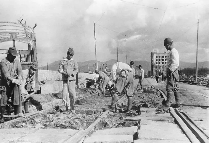 Framed Print : Japanese soldiers repair street car tracks in devastated Hiroshima after the end of World War 2 Framed Print : Japanese soldiers repair street car tracks in devastated Hiroshima after the end of World War 2