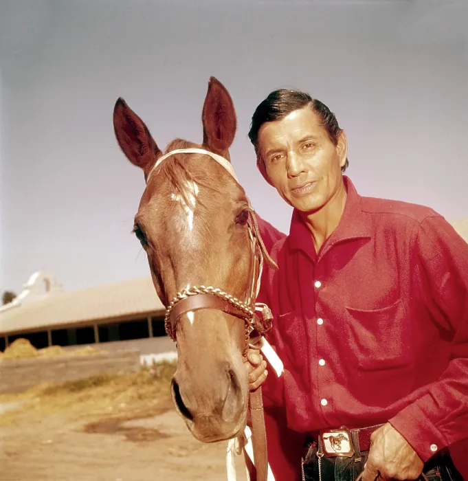 Framed Print : Jay Silverheels of THE LONE RANGER poses with his three-year-old girl race horse horse, Sanderella, at Caliente track in Tijuana, Mexico, 1956 Framed Print : Jay Silverheels of THE LONE RANGER poses with his three-year-old girl race horse horse, Sanderella, at Caliente track in Tijuana, Mexico, 1956