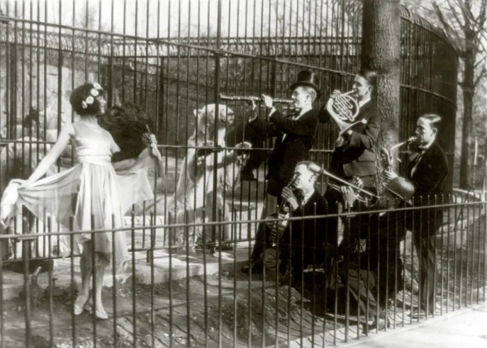 Framed Print : Jazz for the bears, five men playing musical instruments and a woman dancing in front of bears in cage at the National Zoo, Washington D.C, May, 1920-1932 Framed Print : Jazz for the bears, five men playing musical instruments and a woman dancing in front of bears in cage at the National Zoo, Washington D.C, May, 1920-1932