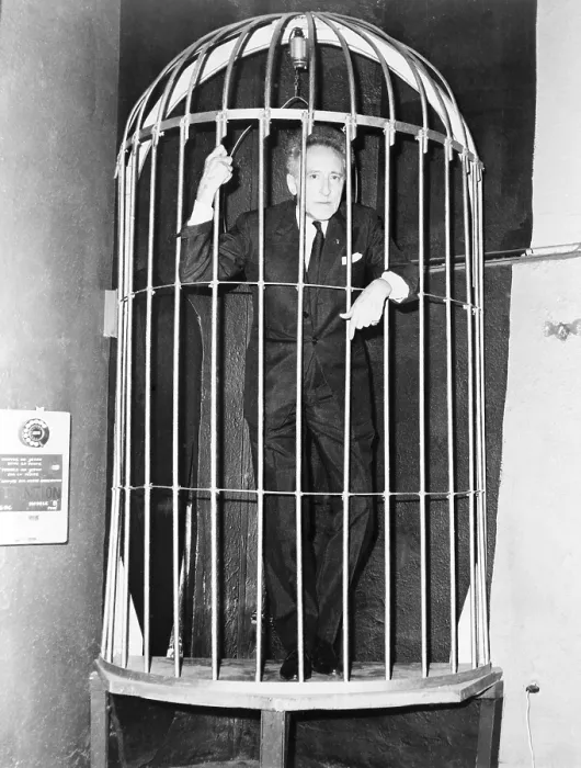 Framed Print : Jean Cocteau (1889-1963), inside a huge bird case during cocktail party he gave in Paris, on the occasion of his new play, THEATRE FORAIN, March 15, 1961 Framed Print : Jean Cocteau (1889-1963), inside a huge bird case during cocktail party he gave in Paris, on the occasion of his new play, THEATRE FORAIN, March 15, 1961
